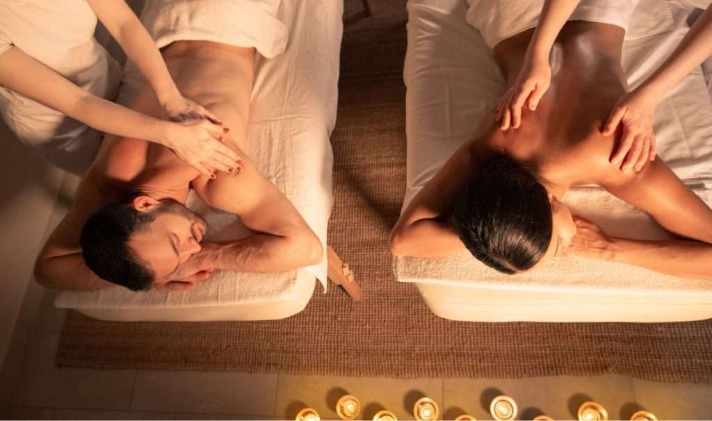 A couple enjoy a massage at Woodlands Wellness in Glencoe.