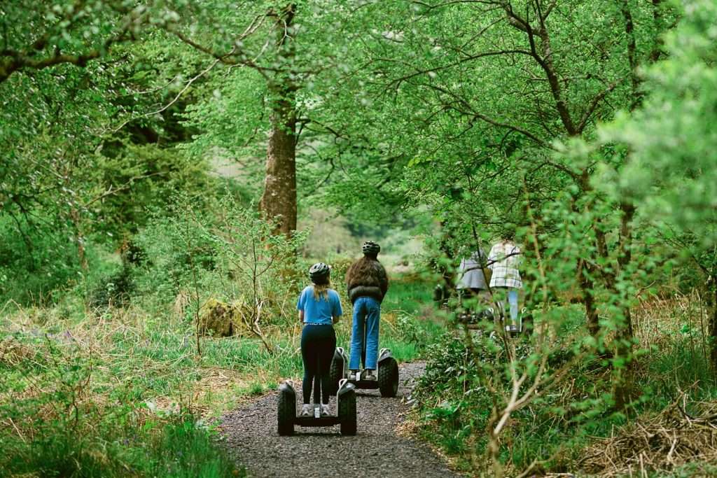 Through the trees on an off road segway adventure in Glencoe, Scotland