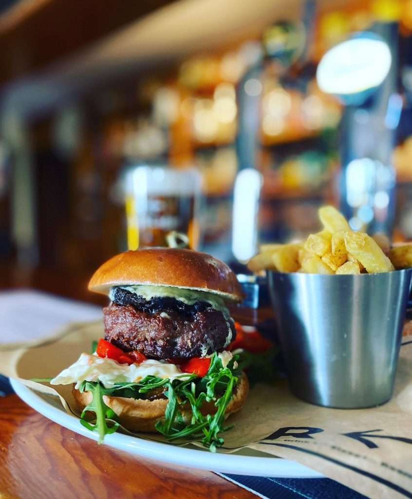 A big juicy burger at Roam West. One of Woodlands favourite restaurants in Glencoe.