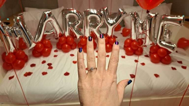 A newly engaged guest shows off her engagement ring at RiverBeds Luxury Wee Lodges at Woodlands Glencoe.