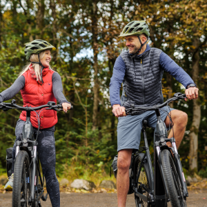 A couple enjoy e-bike hire at Woodlands Activity Centre.