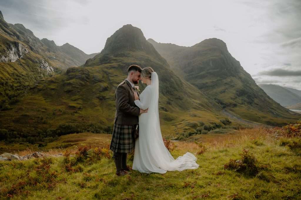 A happy couple get married at one of Glencoe's iconic locations close to the Woodlands Estate.