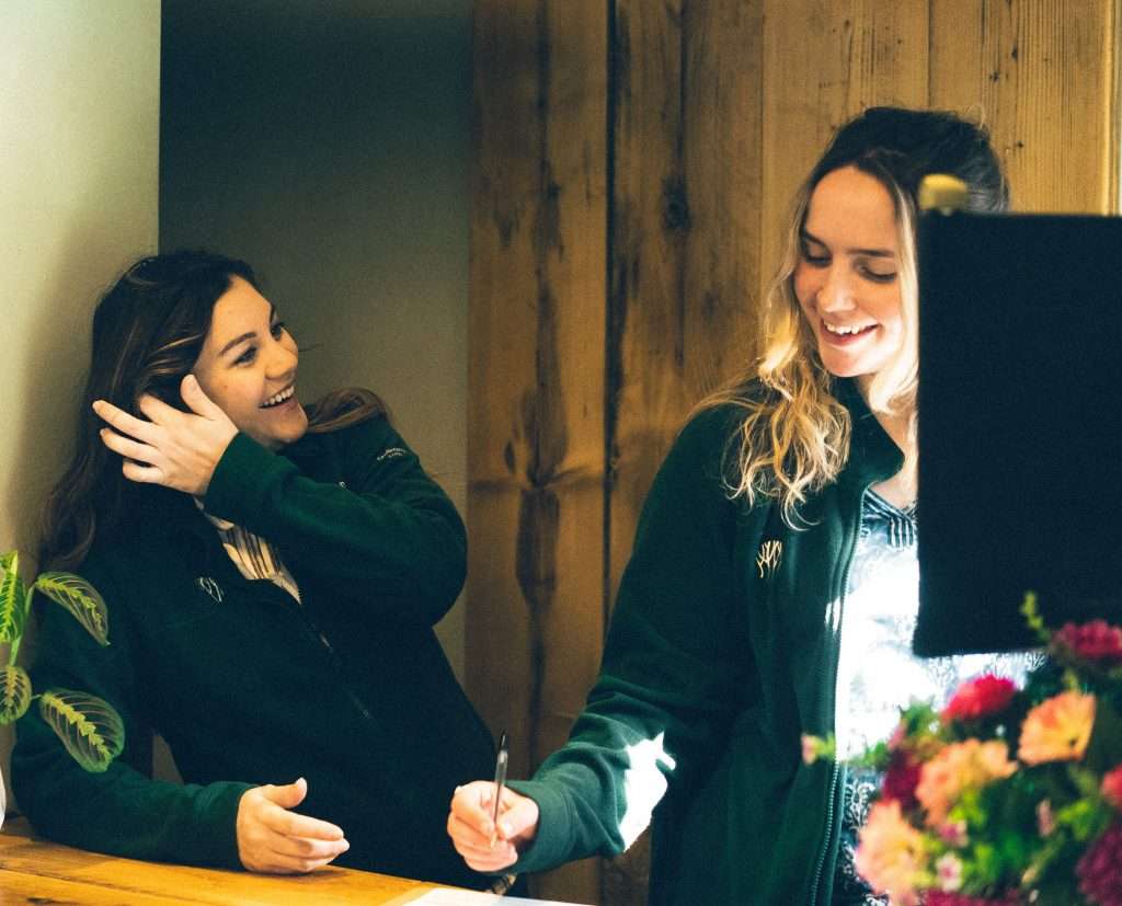 Women laughing together at work