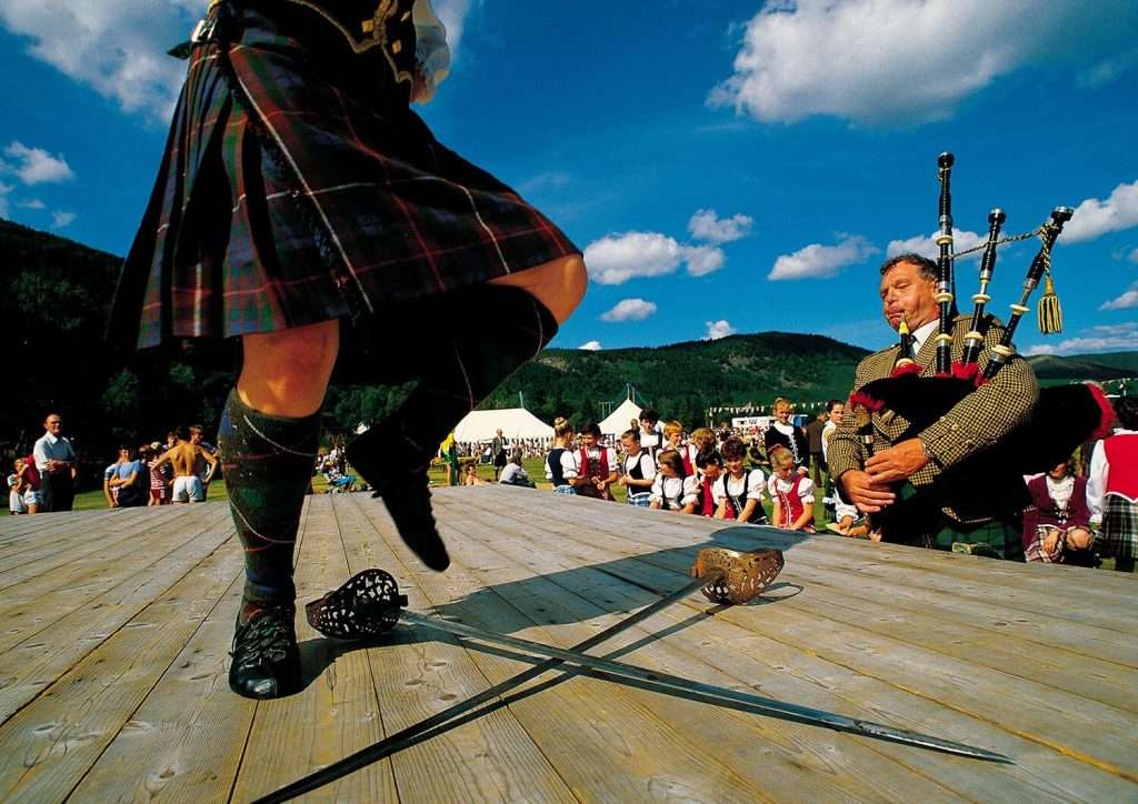 Highland dancers doing the sword dance at the Highland Games.