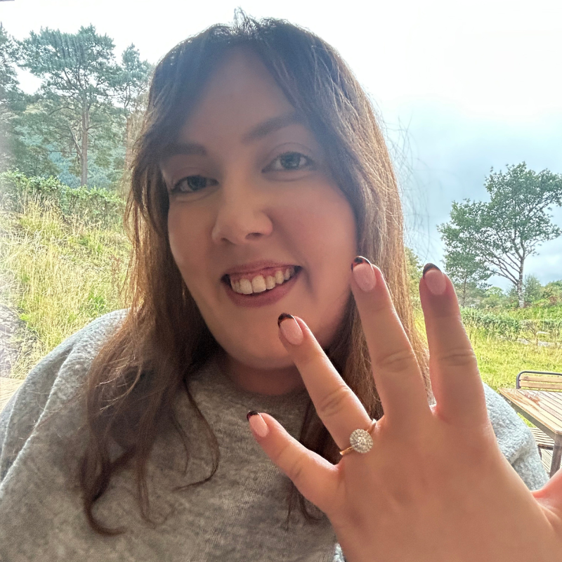 A lady shows off her new engagement ring in Forest Corner at Woodlands Glencoe.