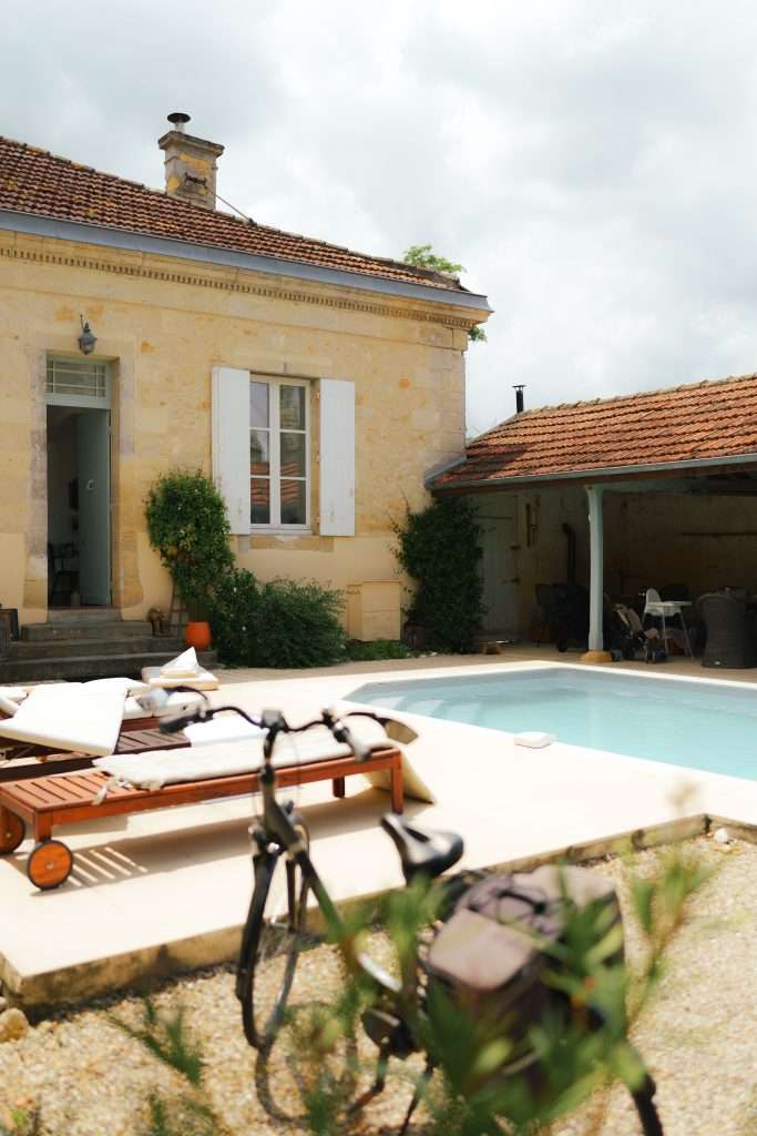 The swimming pool and terrace area at the family friendly School House in Pujols, Aquataine, South West France. Great large group accommodation.