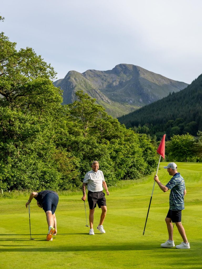 Three players take on Woodlands Glencoe Golf Course.